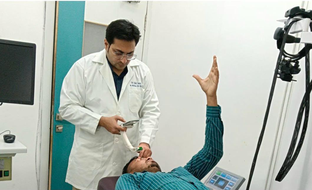 Dr. Rohit Laul using an MII device on a patient in Nashik